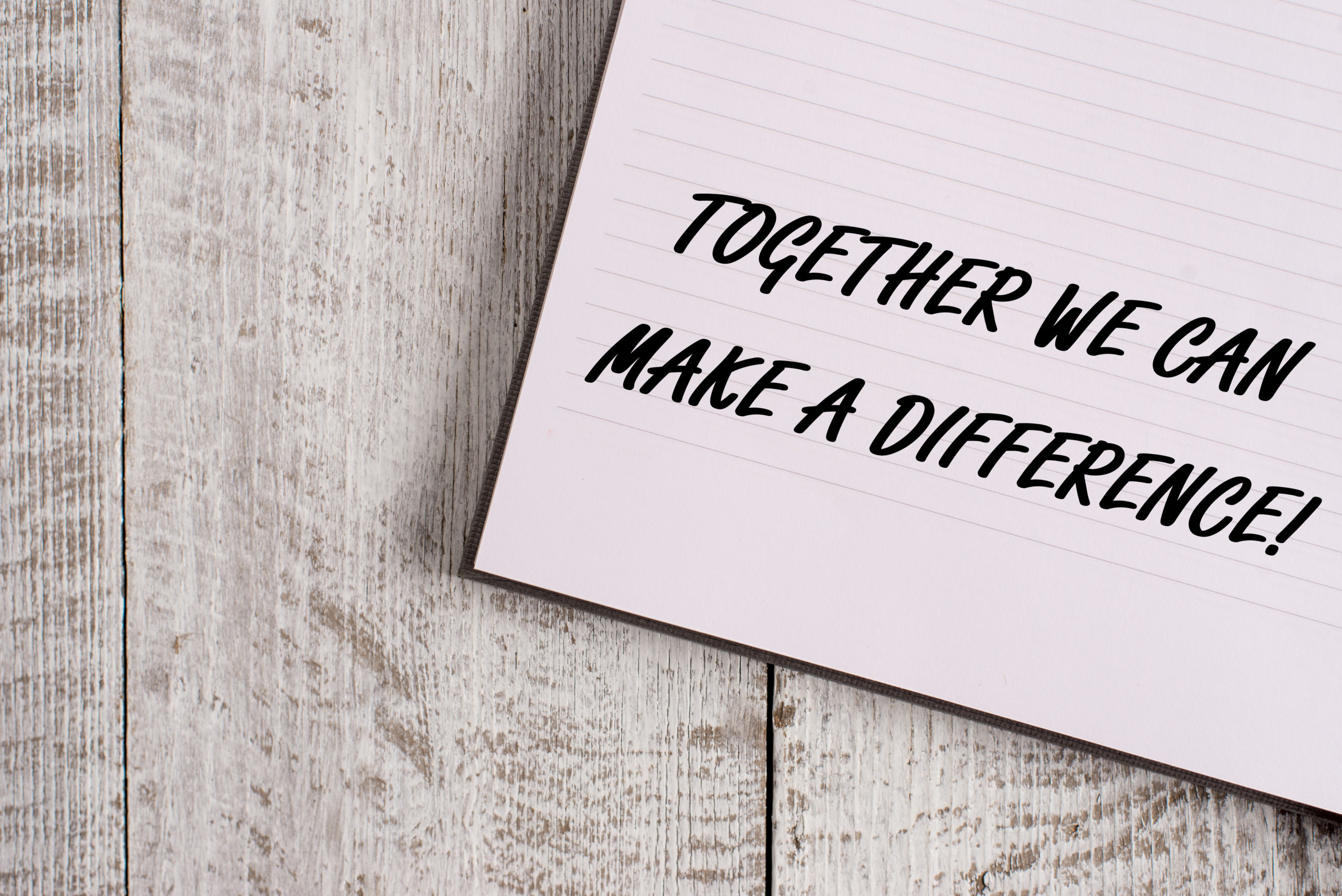Conceptual Hand Writing Showing Together We Can Make A Difference. Business Photo Showcasing Be Very Important Some Way In Like Team Or Group Notebook Stationary Placed Above Classic Wooden Backdrop.